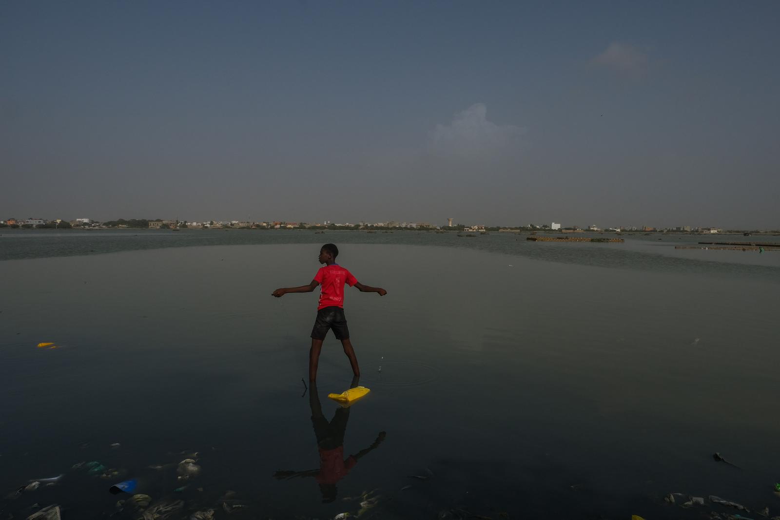 Photos show Senegal neighborhood disappearing as sea levels rise - The  Washington Post