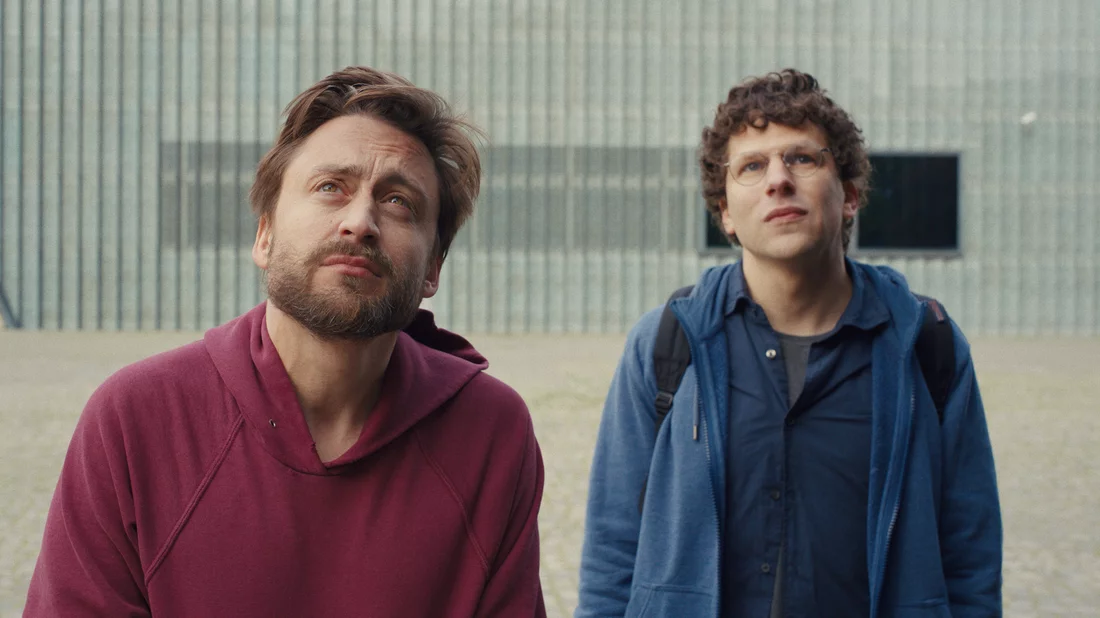 Kieran Culkin and Jesse Eisenberg in </em>A Real Pain.</em>