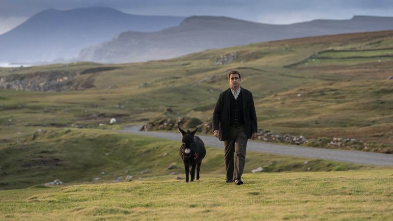 Colin Farrell and a miniature donkey in <em>The Banshees of Inisherin</em>