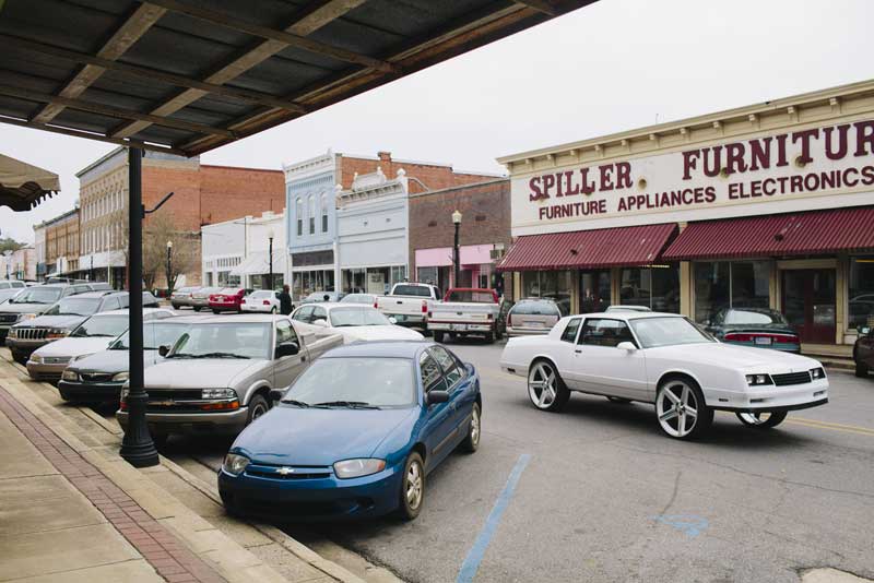 Cars along Main Street in Greensboro, Alabama