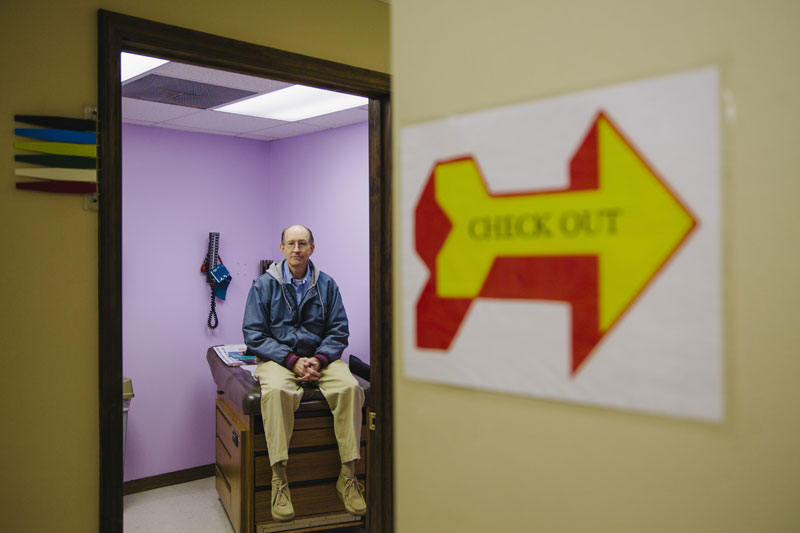 Dr. Perry Timberlake poses for a portrait in an examination room at the Hale County Hospital Clinic on in Greensboro, Alabama